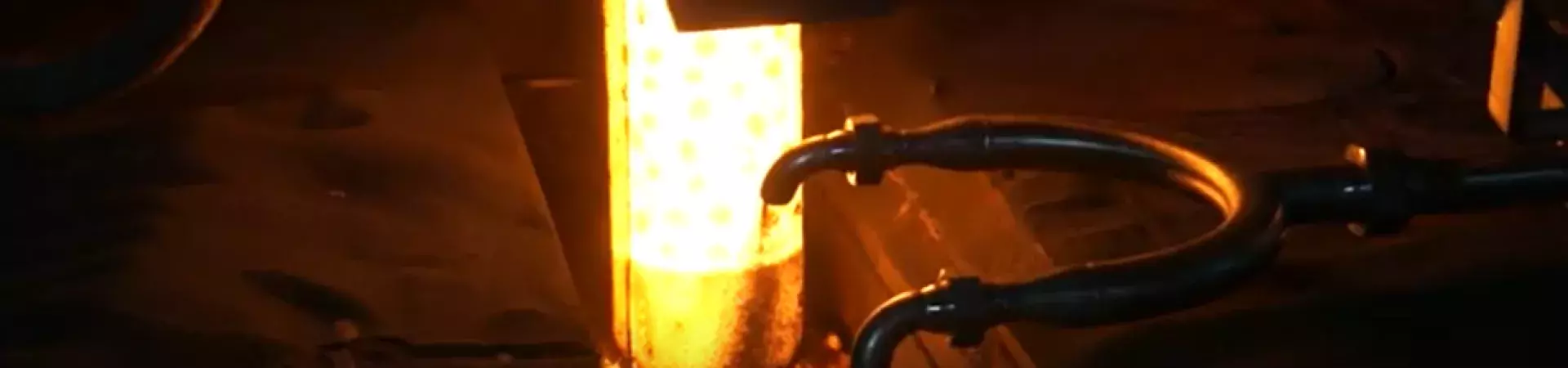 Steel casting fluxes being introduced into the mold